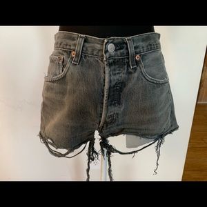 Distressed Levi’s high-waisted black denim cutoffs